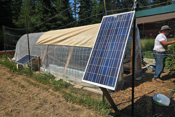 GREENHOUSE WITH SOLAR PANELS